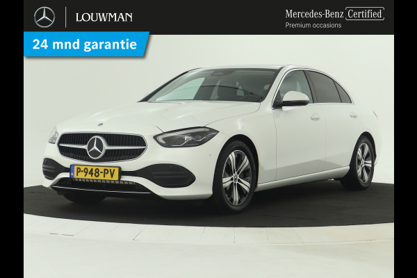 Mercedes-Benz C-Klasse 200 Launch Edition Luxury Line | Achteruitrijcamera | Dodehoekdetector | Sfeerver;ichting | Navigatie | Inclusief 24 maanden MB Certified garantie voor Europa.