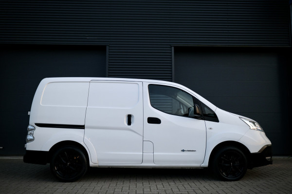 Nissan e-NV200 24 kWH | Airco | Camera | Stuur- en stoelverwarming | Trekhaak | Bluetooth | Nieuwe APK | 170KM Actieradius | Zero emissie | 100% elektrisch