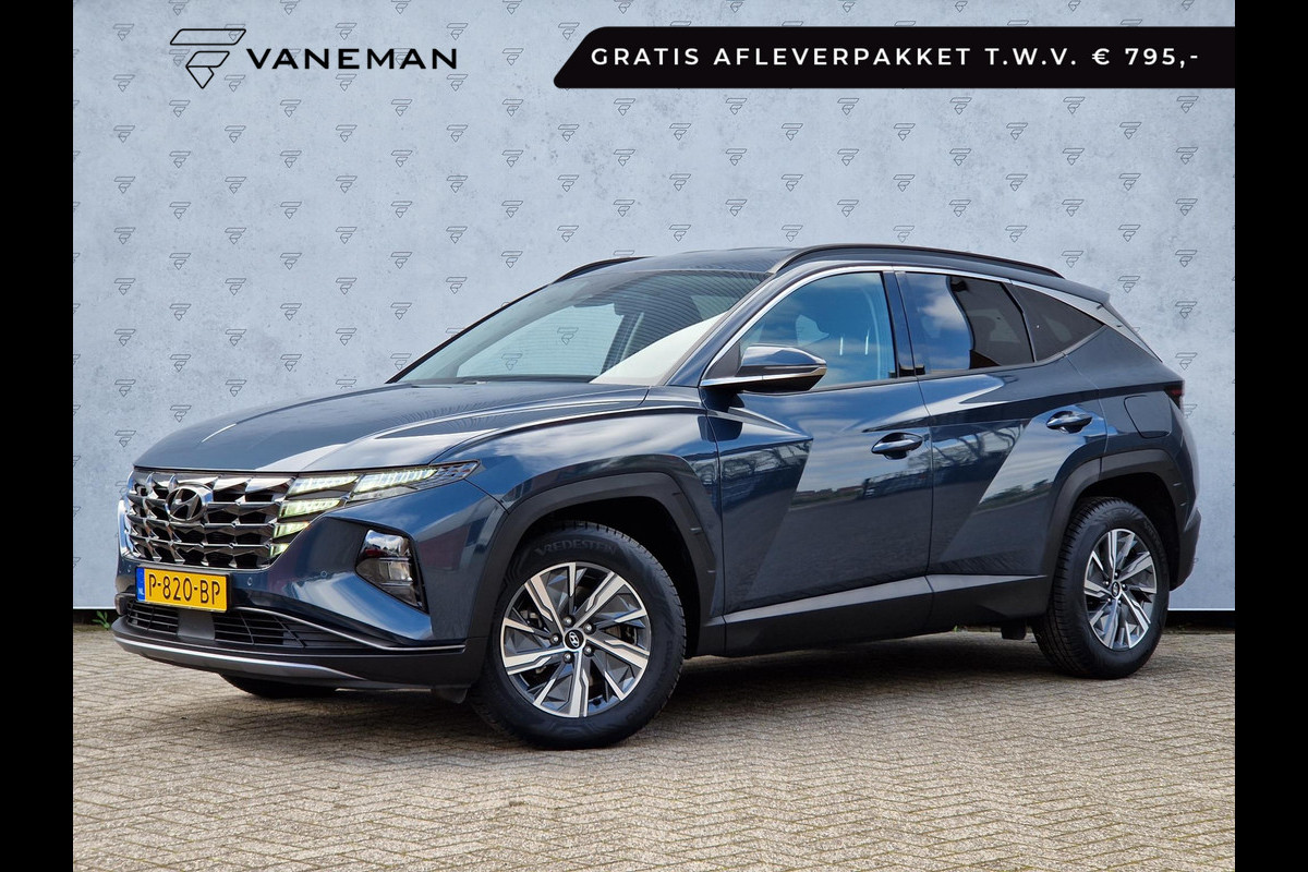 Hyundai Tucson 1.6 T-GDI HEV Automaat | Camera | Navi | Clima | Stoelverwarming | Apple CarPlay/Android Auto | 17" Velgen | PDC | Cruise | LED |