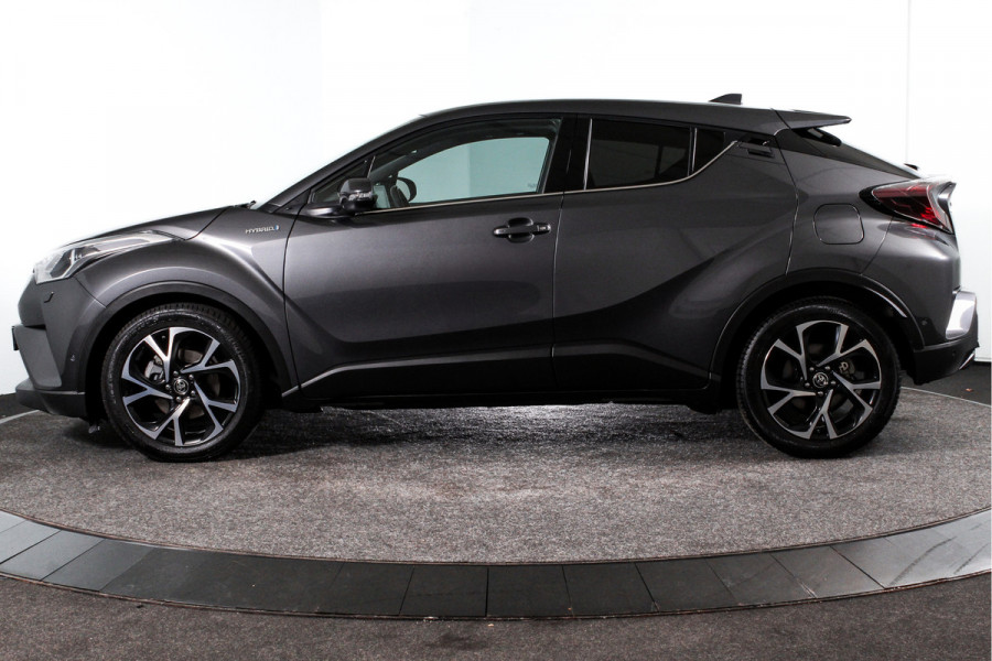 Toyota C-HR 1.8 Hybrid Dynamic | Adapt. Cruise | Winterpakket | Leder bekleding | Camera | PDC | NAV | Auto. Airco | Afn. Trekhaak | LM 18"|