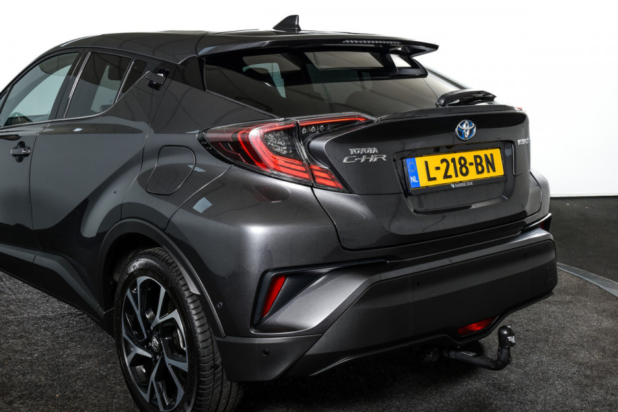 Toyota C-HR 1.8 Hybrid Dynamic | Adapt. Cruise | Winterpakket | Leder bekleding | Camera | PDC | NAV | Auto. Airco | Afn. Trekhaak | LM 18"|