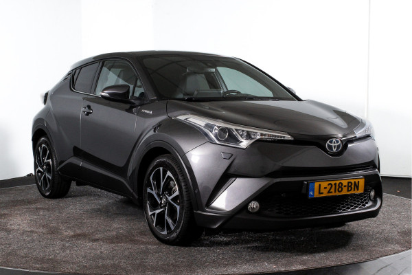 Toyota C-HR 1.8 Hybrid Dynamic | Adapt. Cruise | Winterpakket | Leder bekleding | Camera | PDC | NAV | Auto. Airco | Afn. Trekhaak | LM 18"|