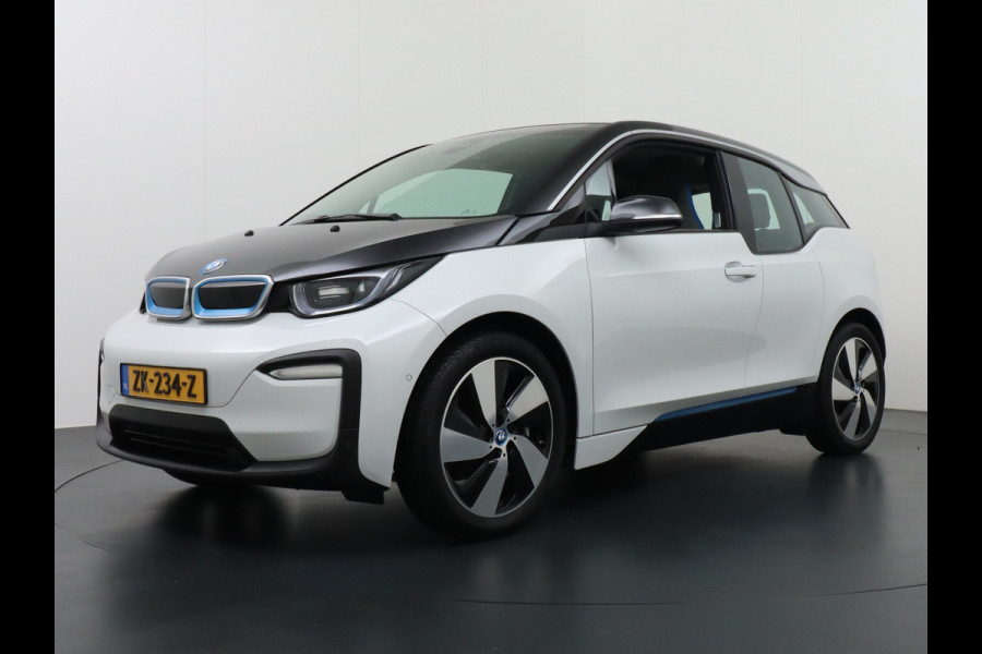 BMW i3 120Ah 42kWh Adap.Cruise Warmtepomp Camera Navi Bordherk. Pdc KeylessStart Tel. Stoelverw. Isofix 19''LM Basis