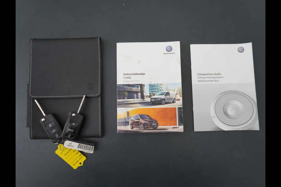 Volkswagen Caddy 2.0TDI EURO 6 Airco Schuifdeur-R Betonplex-Vloer Lat om Lat betimmering Multimedia systeem ESP ASR Elek.ramen Buitenspiegels ele Vervolgbotsing preventie Bluetooth  Brake Assist System Achterruit+Wissers+verwarmd Tussenwand m rooster Achterruitenwisser