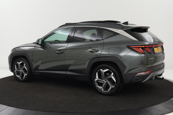 Hyundai Tucson 1.6 T-GDI PHEV Premium Sky 4WD | Panoramadak | Stoelventilatie | Trekhaak | Leder | Adaptive cruise | 360 camera | Carplay | Full LED | Verwarmd stuurwiel