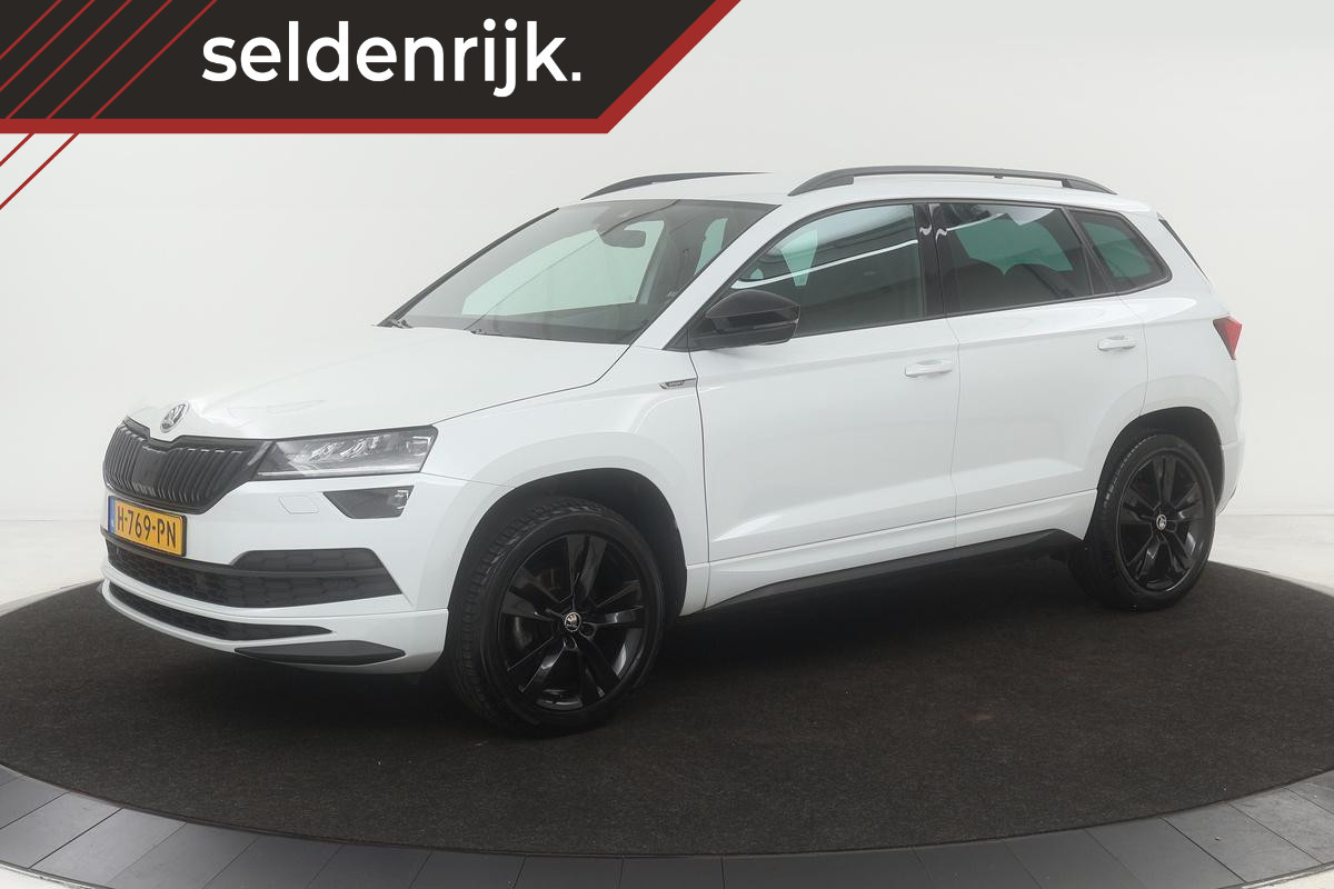 Škoda Karoq 1.5 TSI Sportline | Trekhaak | Adaptive cruise | Stoelverwarming | Carplay | Camera | Full LED | Canton | Keyless | Sportstoelen | Dodehoek detectie