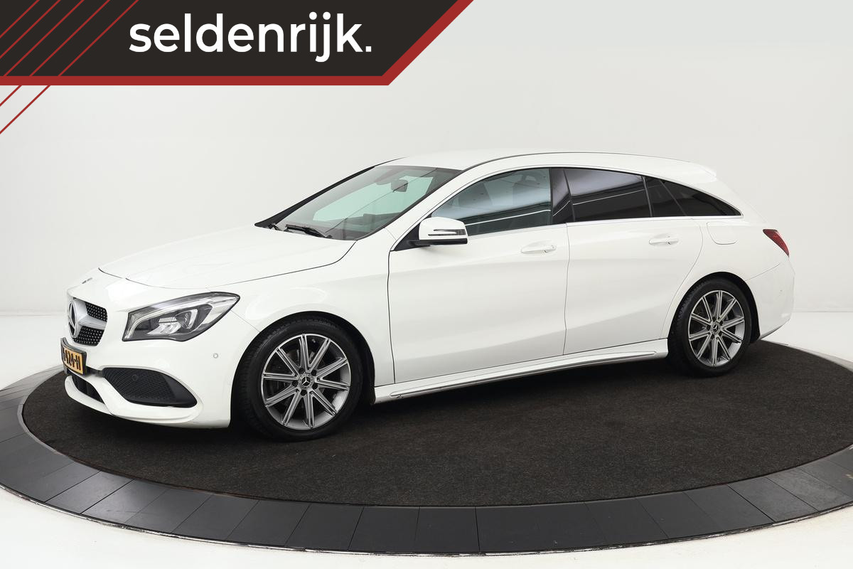 Mercedes-Benz CLA-Klasse Shooting Brake 180 AMG | Trekhaak | Leder/alcantara | Stoelverwarming | Full LED | PDC | Camera | Climate control | Getint glas