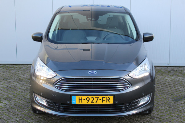 Ford C-MAX 1.0-125pk Titanium. Keurige, luxe en goed onderhoud wagen. Volautm. airco dual, stoel-, stuur- en voorraamverw., camera, parkeersensoren v+a, cruise control, parkeerassistent, trekhaak, navigatie, telefoonvoorb., LM wielen, metallic lak etc.