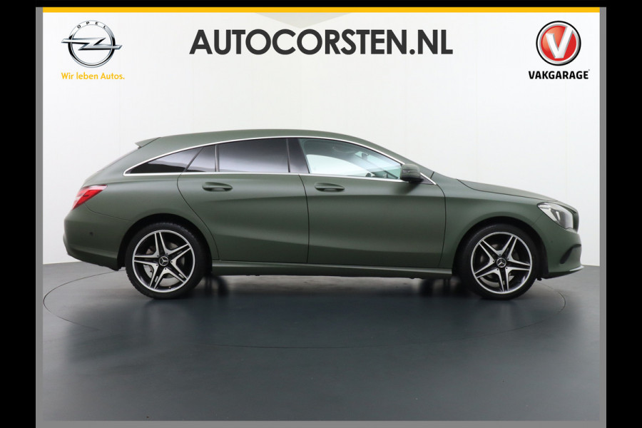 Mercedes-Benz CLA-Klasse Shooting Brake 180 18"Lmv AMG Sportstoelen Navi High-performance-LED Pdc Cruise Night Pakket Urban Pakket Control Ambition Zitcomfortpakket Parkeerpilot Led Bluetooth Camtronic Privacy Glas Garmin® MAP PILOT Voorzien van een Groen-grijze-wrap