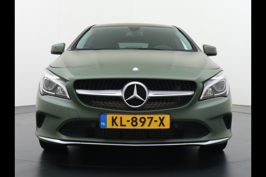 Mercedes-Benz CLA-Klasse Shooting Brake 180 18"Lmv AMG Sportstoelen Navi High-performance-LED Pdc Cruise Night Pakket Urban Pakket Control Ambition Zitcomfortpakket Parkeerpilot Led Bluetooth Camtronic Privacy Glas Garmin® MAP PILOT Voorzien van een Groen-grijze-wrap