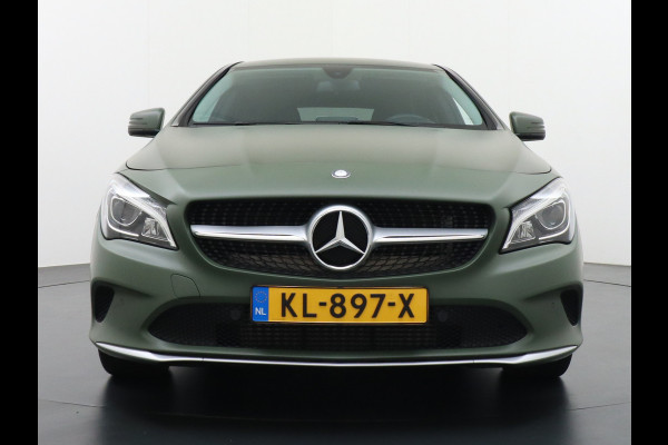 Mercedes-Benz CLA-Klasse Shooting Brake 180 18"Lmv AMG Sportstoelen Navi High-performance-LED Pdc Cruise Night Pakket Urban Pakket Control Ambition Zitcomfortpakket Parkeerpilot Led Bluetooth Camtronic Privacy Glas Garmin® MAP PILOT Voorzien van een Groen-grijze-wrap