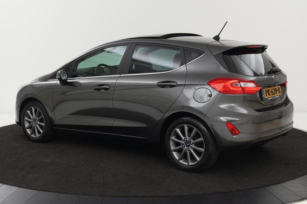 Ford Fiesta 1.0 EcoBoost Titanium | Panoramadak | Adaptive cruise | Carplay | Camera | B&O Sound | Climate control | Park Assist | Navigatie