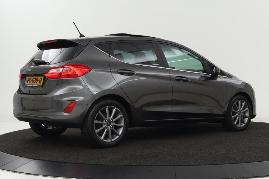 Ford Fiesta 1.0 EcoBoost Titanium | Panoramadak | Adaptive cruise | Carplay | Camera | B&O Sound | Climate control | Park Assist | Navigatie