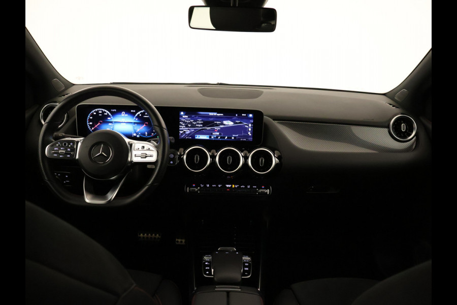 Mercedes-Benz B-Klasse 180 Business Solution AMG | Lichtmetalen velgen 5 spaaks | MBUX wide screen | Navigatie | Parking support met camera achter | Inclusief 24 maanden MB Certified garantie voor Europa.