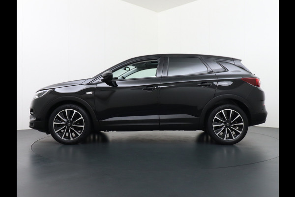 Opel Grandland X 1.6T 180PK Automaat Apple Carplay Android Auto Panoramadak Navi Ecc 360° Camera DAB Bluetooth Draadloze tel.lader Denon® Sound Dodehoek detector Lane Assist Lmv 19" Regen-Licht Sensor Pdc Adaptief licht Led Business Elegance 1e Eigenaar