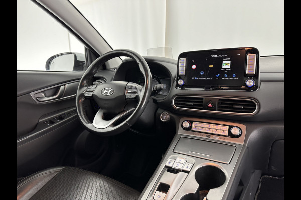 Hyundai Kona EV Premium 64 kWh (INCL-BTW) *FULL-LEATHER | HEAD-UP | FULL-LED | NAVI-FULLMAP | DAB | ADAPTIVE-CRUISE | KRELL-AUDIO | KEYLESS | CAMERA | BLIND-SPOT | LANE-ASSIST | DIGI-COCKPIT | COMFORT-SEATS | 17''