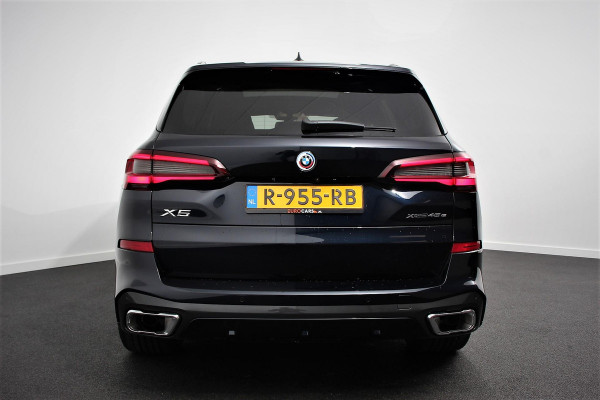 BMW X5 xDrive45e 394pk High Executive M-Sport PHEV 6 cilinder | Panoramisch schuif-kantel dak | Harman Kardon | Head up display | Lederen bekleding | Electrische verstelling comfort stoelen