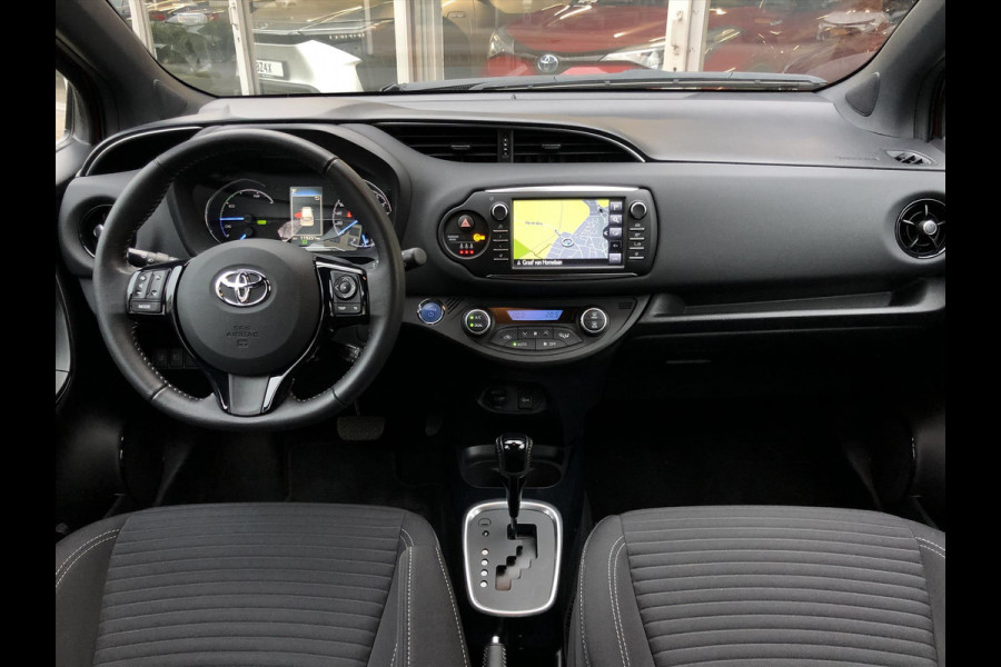 Toyota Yaris 1.5 Hybrid Bi-Tone | Eerste eigenaar, 16 inch, Spoiler, Cruise control, Parkeercamera, Safety sense, Climate control