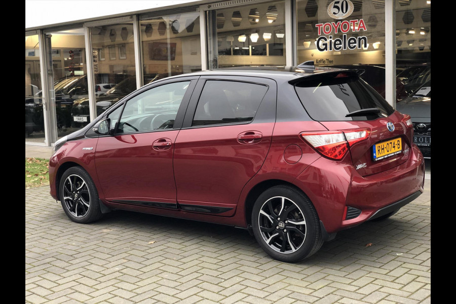 Toyota Yaris 1.5 Hybrid Bi-Tone | Eerste eigenaar, 16 inch, Spoiler, Cruise control, Parkeercamera, Safety sense, Climate control