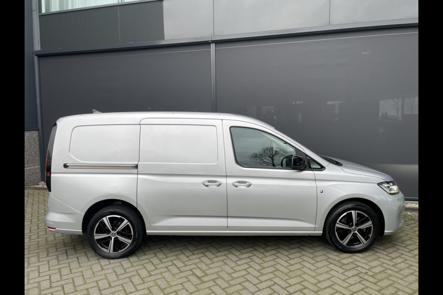 Volkswagen Caddy Cargo Maxi L2H1 2.0 TDI 1st Edition Clim. control - Cruise control - Parkeersensoren A - Navi full map - Radio/Bluetooth - MFL Stuurwiel - LMV 17" - Bot waarschuwingssysteem - Zijschuifdeur R - Tussenschot Volledig