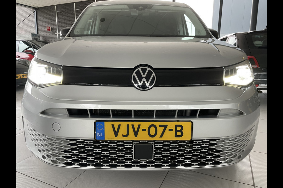 Volkswagen Caddy Cargo Maxi L2H1 2.0 TDI 1st Edition Clim. control - Cruise control - Parkeersensoren A - Navi full map - Radio/Bluetooth - MFL Stuurwiel - LMV 17" - Bot waarschuwingssysteem - Zijschuifdeur R - Tussenschot Volledig