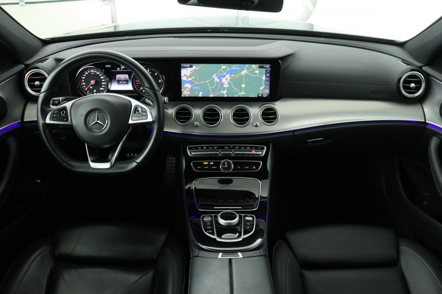 Mercedes-Benz E-Klasse 220d AMG | Leder | Sfeerverlichting | Full LED | Camera | Stoelverwarming | Navigatie | Park Assist | Bluetooth