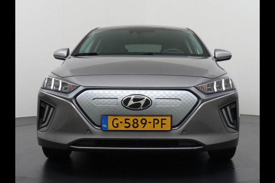 Hyundai IONIQ Premium EV 38kWh Apple Carplay Android Auto Navi Ecc Leder Elec.Stoel + Verwarming/ventilatie Stuurverwarming Camera DAB Keyless Cruise Control Led Infinity® Luidsprekers Achterbank verwarmd Bluetooth Dodehoek detector Draadloze tel.lader 1e Eigenaar