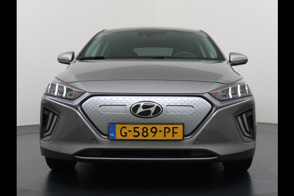 Hyundai IONIQ Premium EV 38kWh Apple Carplay Android Auto Navi Ecc Leder Elec.Stoel + Verwarming/ventilatie Stuurverwarming Camera DAB Keyless Cruise Control Led Infinity® Luidsprekers Achterbank verwarmd Bluetooth Dodehoek detector Draadloze tel.lader 1e Eigenaar