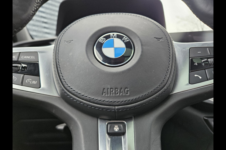 BMW 1-serie 118i M Sport Dealer O.H Misanoblauw | Panodak | Keyless |  Trekhaak Afn | Camera | Apple Carplay | Sfeerverlichting | Sportstoelen Verwarmd | Navi Pro |