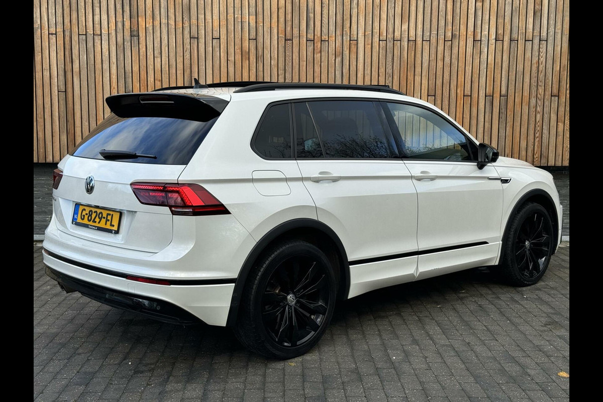 Volkswagen Tiguan 1.5 TSI R-line Automaat | Panorama | Leer | LED Verlichting | Actief Demping Systeem | Achteruitrijcamera | Black Style | 20 inc