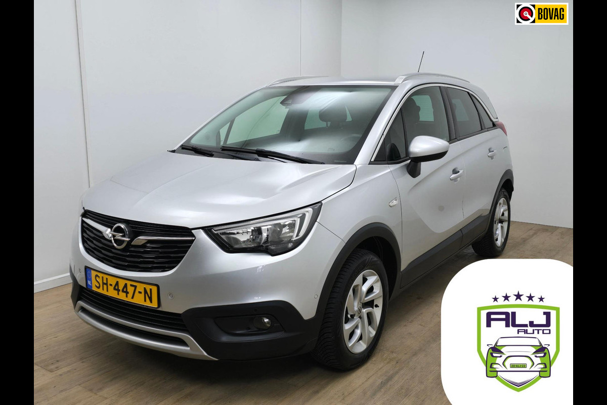 Opel Crossland X Occasion 1.2 Turbo met parkeercamera en carplay | Tweedehands Opel Crossland X in grijs met trekhaak | Volle auto