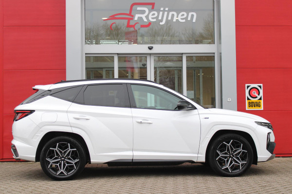 Hyundai Tucson 1.6 T-GDI 266PK PHEV N LINE 4WD | NAVIGATIE | APPLE CARPLAY/ANDROID AUTO | ADAPTIVE CRUISE CONTROL | DODEHOEK DETECTIE | VOOR/ACHTERBANK VERWARMD | CLIMATE CONTROL | FULL LED KOPLAMPEN | ACHTERUITRIJ CAMERA | ELEKTRISCH BEDIENBARE ACHTERKLEP | STUUR VERWARMING | KEYLESS ENTRY/START | 19" LICHTMETALEN VELGEN | DODEHOEK DETECTIE |