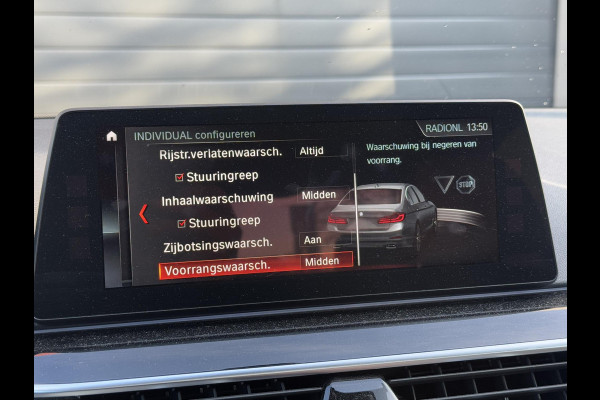 BMW 5 Serie M550i xDrive High Executive | Panoramadak | Head-Up Display | Harmon Kardon | Camera | Stoel Ventilatie/Verwarming |