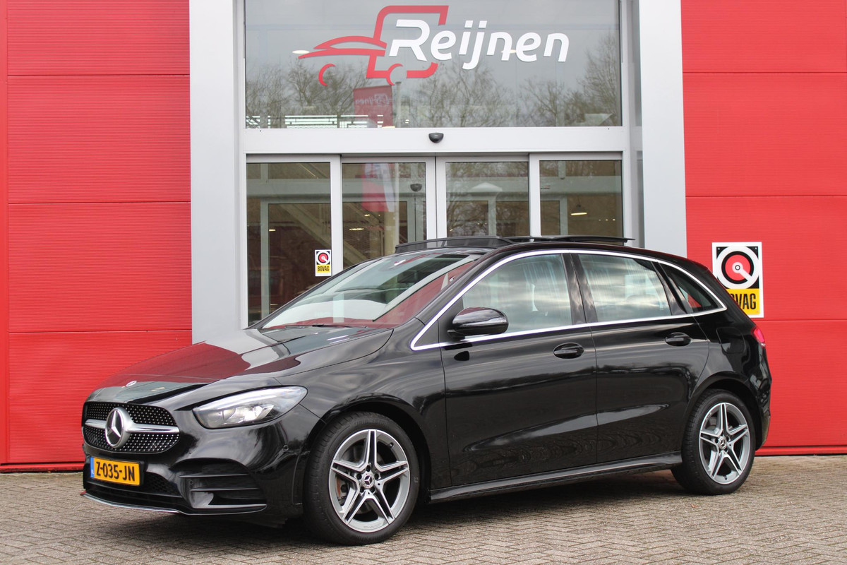 Mercedes-Benz B-Klasse 250 e 218PK AMG LINE | PANORAMISCH SCHUIF/KANTEL DAK | SFEER VERLICHTING | ELEKTRISCHE ACHTERKLEP | LED HIGH PERFROMANCE KOPLAMPEN | APPLE CARPLAY/ANDROID AUTO | STOEL VERWARMING | PARKEERSENSOREN VOOR EN ACHTER | CRUISE CONTROL |