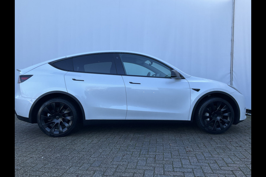 Tesla Model Y Long Range AWD 75 kWh 514pk Autopilot Stuur/Stoelverw Pano Trekhaak (1600kg)