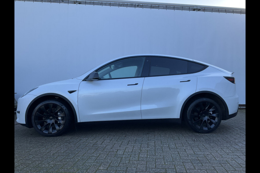 Tesla Model Y Long Range AWD 75 kWh 514pk Autopilot Stuur/Stoelverw Pano Trekhaak (1600kg)