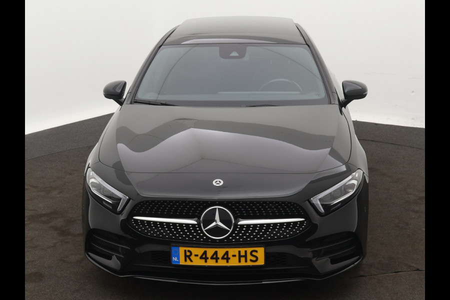 Mercedes-Benz A-Klasse 180 Business Solution AMG | AMG-Styling | Panoramadak | Multibeam LED | NIghtpakket | 18 inch Multispaaks velgen | Sfeerverlichting | Navigatie | Smartphone-integratie | Inclusief 24 maanden MB Certified garantie voor Europa.