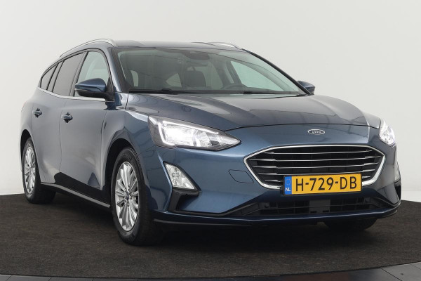 Ford Focus 1.5 EcoBoost Titanium | Stoel & stuurverwarming | Trekhaak | Carplay | Navigatie | Climate control | Full LED | Keyless