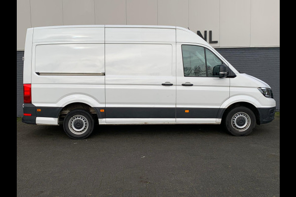 Volkswagen Crafter 2.0TDI L3H2 3p.Navigatie PDC-a+v Airco Cruise-Control Licht-Regensensor Dab+ Bluetooth Verwarmbare voorruit+ruitensproeiers Betonplex Lat-om-Lat Betimmering Schuifdeur 1e Eigenaar Euro 6