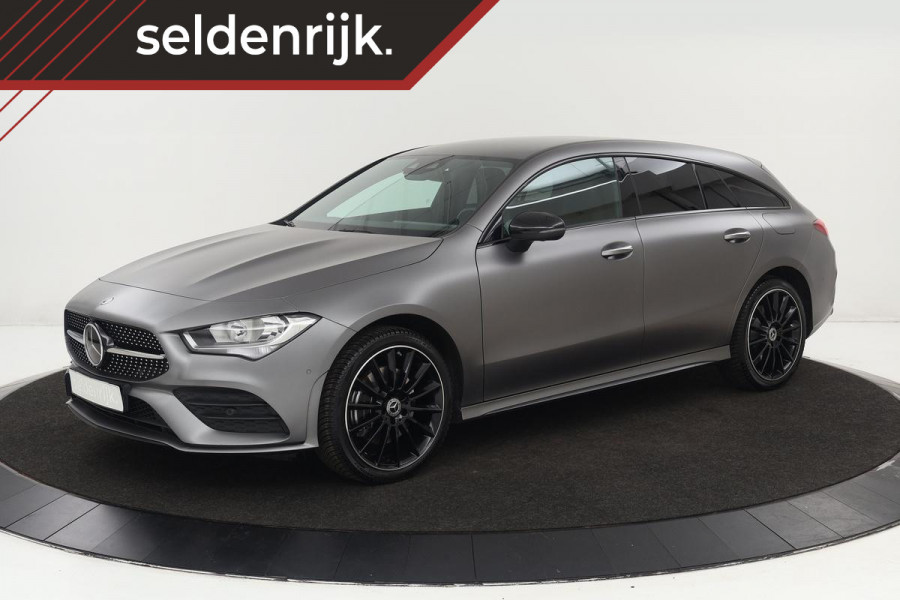 Mercedes-Benz CLA-Klasse 250e AMG Night | Stoelventilatie | Adaptive cruise | 360 camera | Leder | Carplay | Sfeerverlichting | Widescreen | Full LED | Keyless | Designo Mountaingrijs