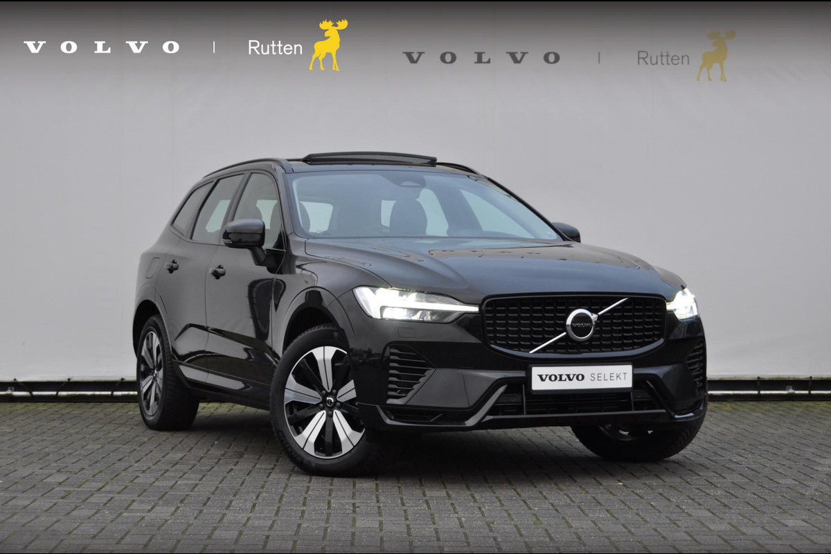 Volvo XC60 T6 350PK Long Range AWD Plus Dark / Panoramisch schuif-kantel dak / Lederen bekleding / Elektrisch bedienbare voorstoelen met geheugen / Stoelverwarming voor en achter / Apple Carplay / Trekhaak /