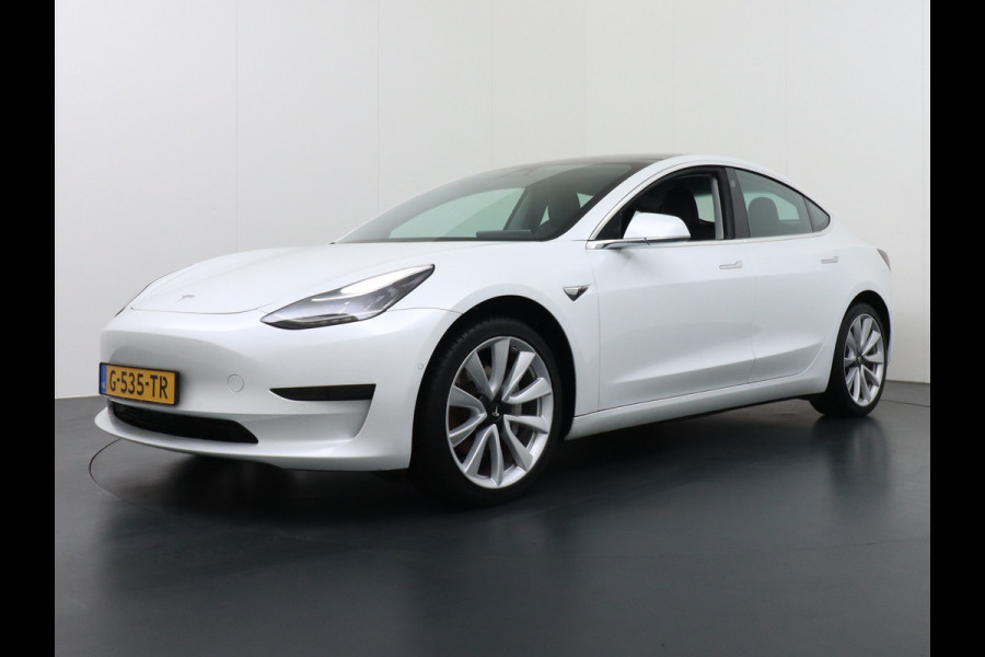 Tesla Model 3 SR+60kWh 326PK AutoPilot FSD-v.b Leer PanoDak Adaptive cruise Premium-Luidsprekers Telefoon-Sleutel 18" Camera's Elektr.-Stuur+S Ecc Navigatiesysteem full map LED-a+v Comfortstoel(en) ACC Dual-ECC DAB Voorverwarmen interieur via App Keyless via Telefoonsleutel One-Pedal-Drive Orig. nlse auto