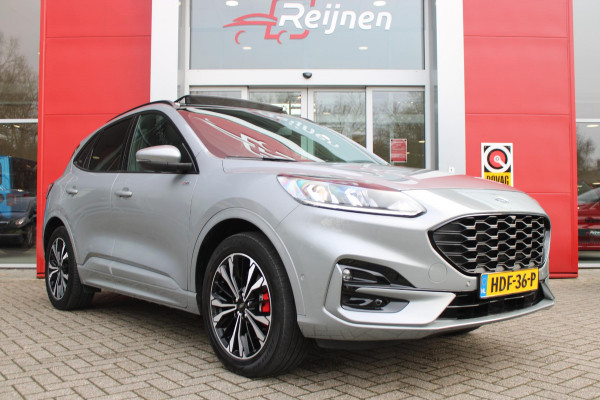 Ford Kuga 2.5 225PK PHEV ST-LINE | PANORAMISCH SCHUIF/KANTEL DAK | ELEKTRISCH BEDIENBARE ACHTERKLEP | FULL LED KOPLAMPEN | 360° CAMERA | KEYLESS ENTRY/START | CLIMATE CONTROL | ADAPTIVE CRUISE CONTROL | DAB+ RADIO | DRAADLOZE TELEFOONLADER | NAVIGATIE | APPLE CARPLAY/ANDROID AUTO | DODEHOEK DETECTIE |