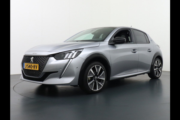 Peugeot e-208 EV GT-line 350 50kWh Panoramadak Apple Carplay Android Auto Adaptieve Cruise Stoelverwarming Camera Keyless Pdc Led DAB+ Lmv 17" Dodehoekdetectie 1/2 Leder Verkeersbord detectie 1e Eigenaar