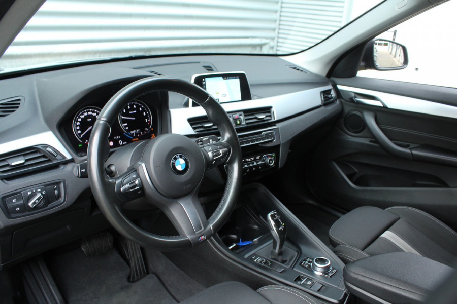 BMW X1 sDrive18i 141pk High Executive Edition Clima Cruise Navi PDC El. Klep Keyless 17"LMV