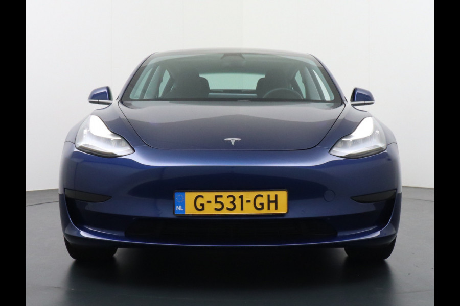 Tesla Model 3 SR+60kWh 325PK FSD-Voorbereid AutoPilot Lmv 18" Leder Pano.Dak Adaptive-Cruise Camera's Elektr.-Stuur+Stoelen+Spiegels+Geheugen+ Ecc Navigatiesysteem full map LED-a+v Comfortstoelen ACC DAB Voorverwarmen interieur via App Keyless via Telefoonsleutel One-Pedal-Drive Orig. nlse auto tot 11kw laden thuis ! Garantie Accu tot 23-09-2027/Max 160.000km 1.584kg licht!