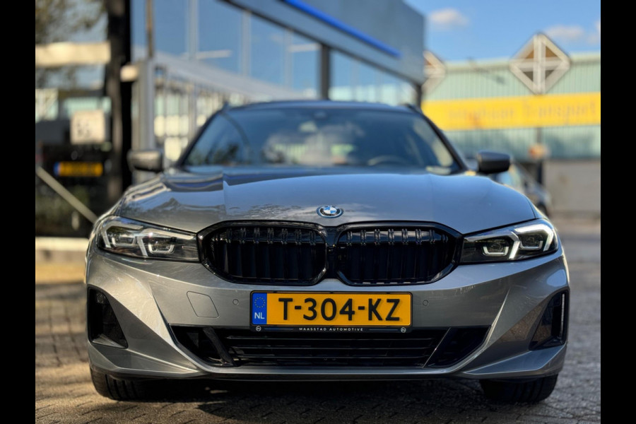 BMW 3 Serie Touring 320e Nieuwstaat AUT Pano Plug in hybrid Wide screen Elek.Trekhaak Stoelverwarming Adaptive LED