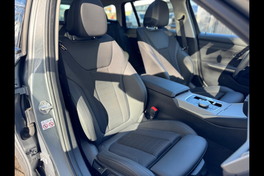 BMW 3 Serie Touring 320e Nieuwstaat AUT Pano Plug in hybrid Wide screen Elek.Trekhaak Stoelverwarming Adaptive LED