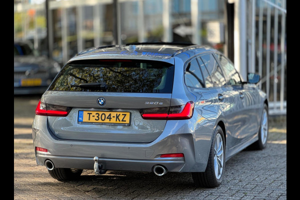 BMW 3 Serie Touring 320e Nieuwstaat AUT Pano Plug in hybrid Wide screen Elek.Trekhaak Stoelverwarming Adaptive LED