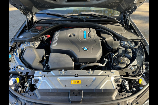 BMW 3 Serie Touring 320e Nieuwstaat AUT Pano Plug in hybrid Wide screen Elek.Trekhaak Stoelverwarming Adaptive LED